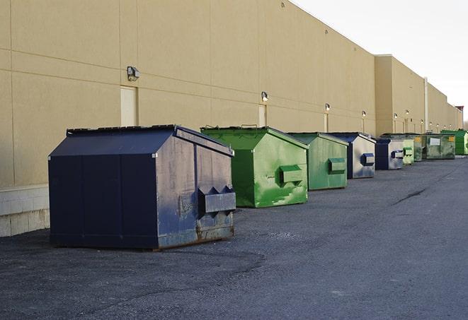 construction dumpsters on a worksite surrounded by caution tape in Chino Hills